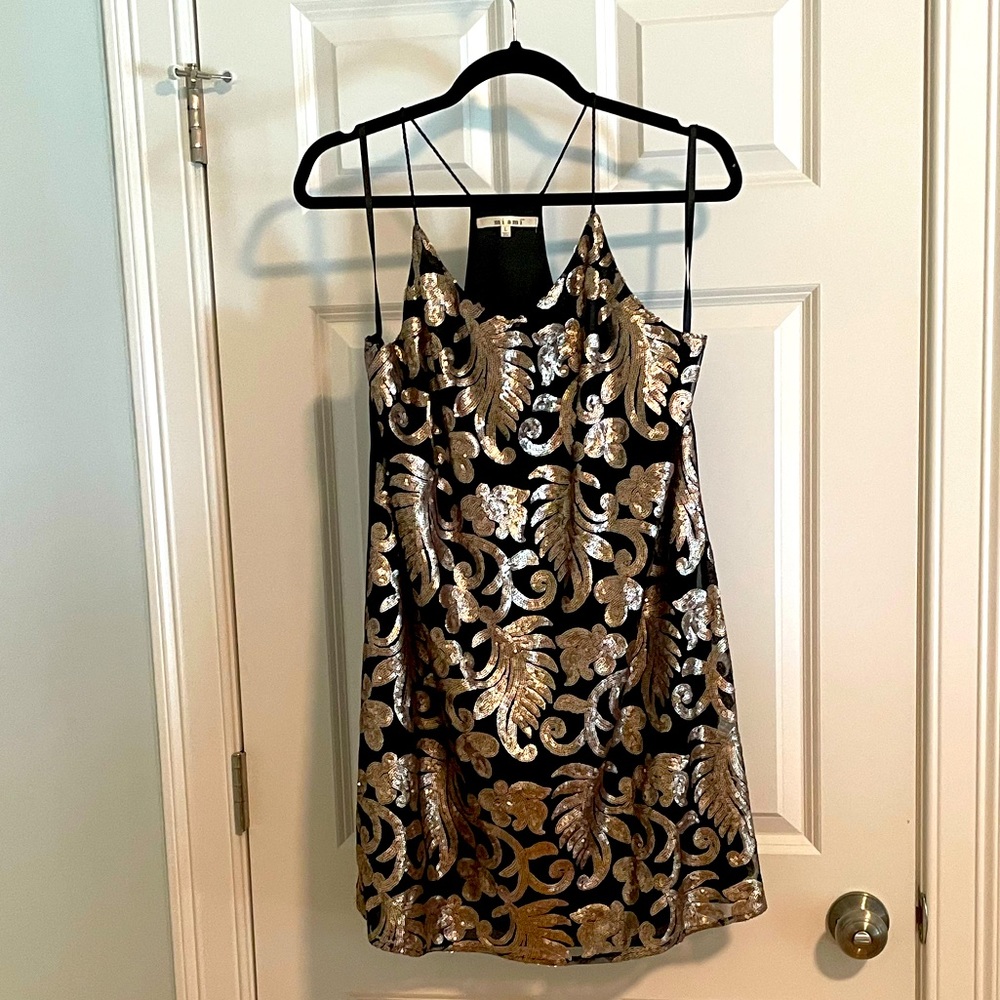 Black mini dress with gold sequin detail